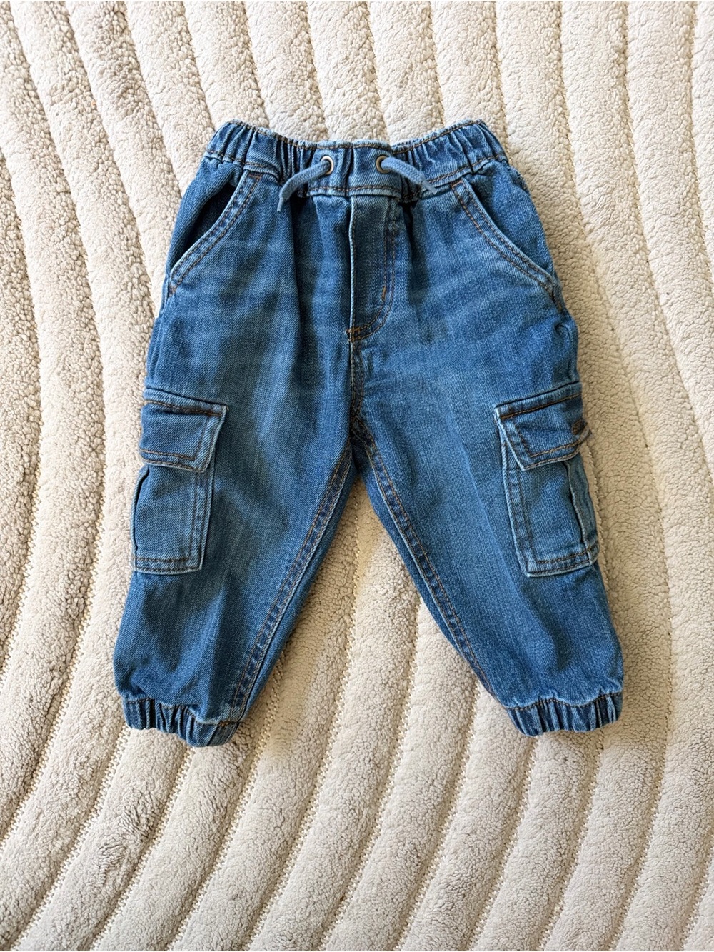 Blue denim cargo pants with elastic waistband and adjustable drawstring- 18M